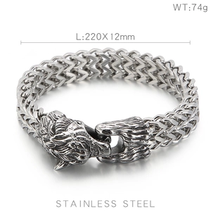 Detail of viking wolf head bracelet in 304 stainless steel with engraved metal texture