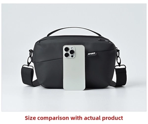 Size comparison showing the black nylon sport crossbody bag next to a smartphone