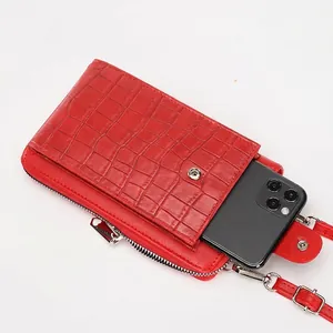 Red crocodile texture crossbody phone bag with adjustable strap and front pocket