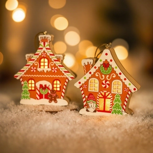 Lighted wooden gingerbread house ornaments with LED glow and festive Christmas patterns