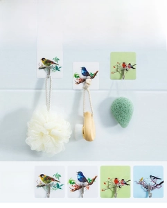 Detail of strong self-adhesive wall hook with traditional Chinese bird painting pattern
