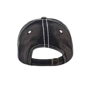 Rear view of washed black denim baseball cap featuring white stitching and metal buckle