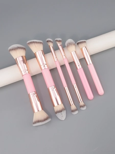 Detailed view of 6-piece pink makeup brush set with rose gold ferrules and soft bristles