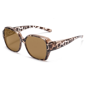 Detailed side view of large leopard print sunglasses with brown polarized lenses
