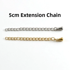 Close-up of 5cm stainless steel extension chains with bell-shaped tail drops in gold and silver