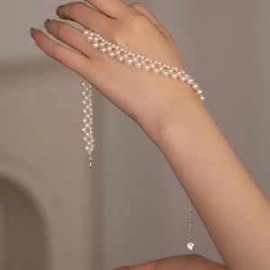 Elegant multi-layer pearl necklace with stainless steel heart pendant and silver clasp