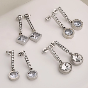 Silver stainless steel dangling earrings set with cubic zirconia and Roman numerals
