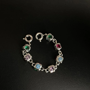 Rainbow gemstone dice pendant chain with colorful stones on silver metal links