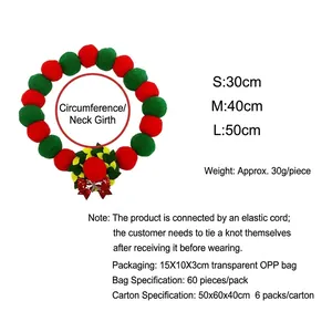 Elastic Christmas pet collar with red and green pompoms and festive holly bow