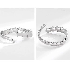 Detail view of retro silver five-pointed star open ring with an adjustable band design
