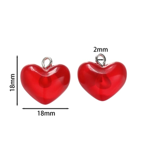 Detail view of red heart acrylic charms showing 18mm dimensions and metal loops