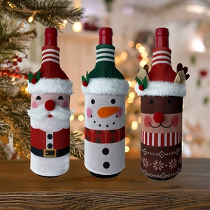 Christmas wine bottle covers featuring Santa, snowman, and reindeer festive designs