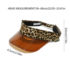 Detail view of leopard print sun visor showing 100% polyester label and size dimensions