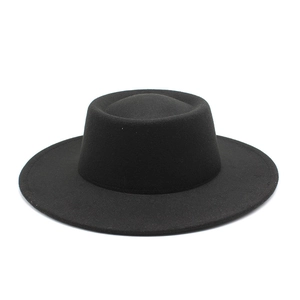 Classic black wool felt fedora hat with flat wide brim for men and women in autumn