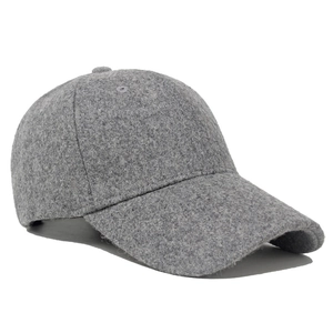 Detail view of the gray wool blend fabric and texture of this winter baseball cap