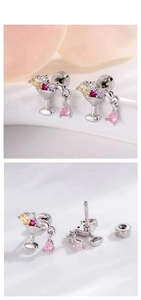 Detailed view of cocktail glass stud earrings with colorful zircons and pink teardrop charm