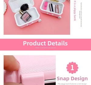 Close-up of the buckle latch on a pink travel suitcase shaped jewelry organizer box