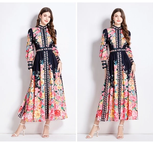 Detail of floral patterns and single-breasted buttons on a vintage court-style maxi dress