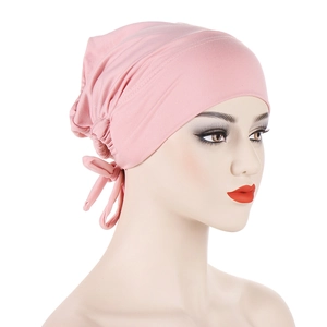 Pink satin-lined drawstring hijab undercap made of soft stretch knit fabric