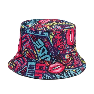 Graffiti print reversible cotton bucket hat with colorful pop art lips and letters