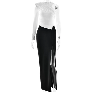 Elegant one-shoulder black and white split evening dress with high slit and pleated bodice