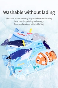 Washable baby cloth book with sea animal patterns submerged in water splashes