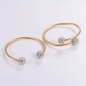 Minimalist adjustable gold steel wire wrap bangle featuring sparkling rhinestone beads