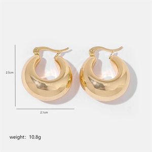Detailed view of chunky gold teardrop earrings showing 2.5cm height and weight specs