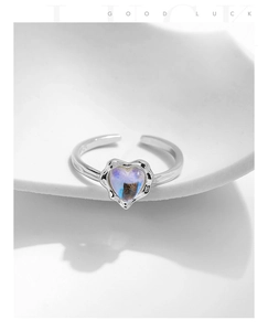 Close-up of S925 silver heart ring with moonstone and adjustable open band design
