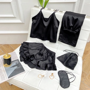 5-piece black satin sleepwear set featuring camisole, pants, shorts, bag and eye mask
