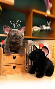 Close-up of plush French Bulldog toys showing realistic facial wrinkles and soft texture