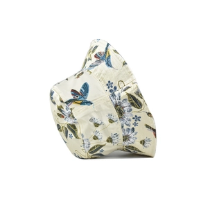 Detail of floral bucket hat with hummingbird print and metal eyelets for ventilation