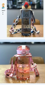 Detail of transparent plastic water bottles with printed straps and minimal classical text