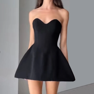 Detail of black strapless mini dress featuring a sweetheart neckline and boning structure