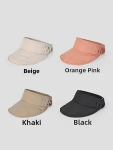 Flat lay of four foldable sun visors in beige, orange pink, khaki, and black colors