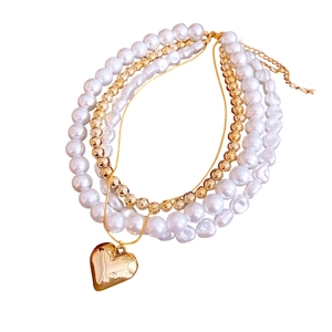 Layered gold heart pendant necklace with pearls, French vintage elegant style for women