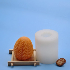 Textured egg silicone mold for DIY Easter candles and plaster crafts with herringbone pattern