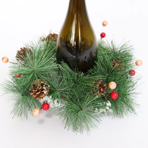 Christmas bottle wreath with green pine needles, pine cones and festive red berries decoration