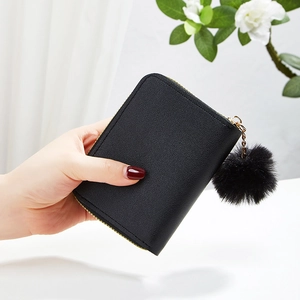 Mini black PU leather zip wallet for women with decorative soft faux fur pompom keychain