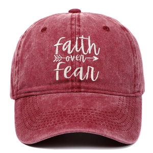 Vintage washed red cotton baseball cap with Faith over Fear white embroidery text