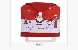 Detailed back view of a red Christmas chair cover with Santa and snowman silk print