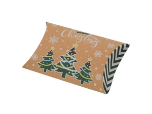 Close-up of kraft paper pillow candy box with Christmas trees and Merry Christmas text