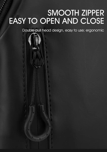 Detail of smooth double pull head zipper and matte waterproof fabric on black chest bag