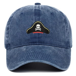 Navy blue washed cotton baseball cap featuring embroidered pirate skull and crossbones
