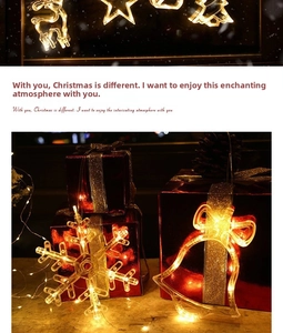 Close-up of warm yellow LED suction cup lights featuring festive reindeer and bell shapes