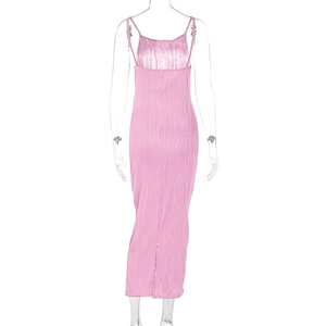 Detailed view of pink pleated fabric texture on a slim fit maxi camisole dress