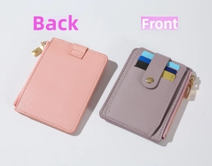 Close-up of pink and grey PU leather card holders with zipper pocket and card slots