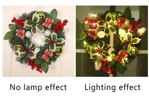 50CM Christmas wreath detail showing natural light vs LED light-up effect with red berries