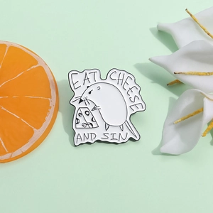 Enamel pin with white mouse and cheese design and Eat Cheese and Sin text art