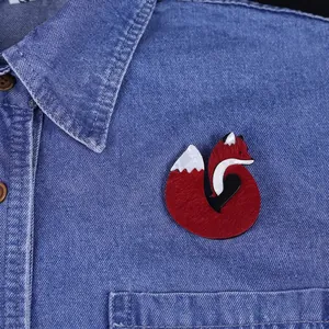 Artistic fox acrylic brooch with hair texture pinned on denim shirt for women